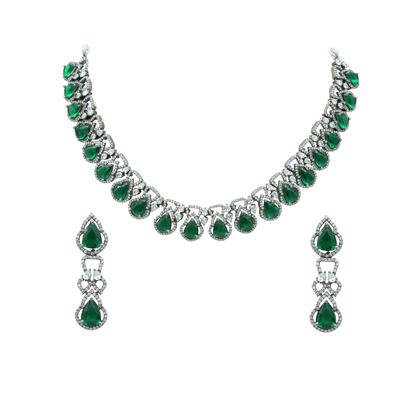 Regal set with moissanites and pear shaped emeralds